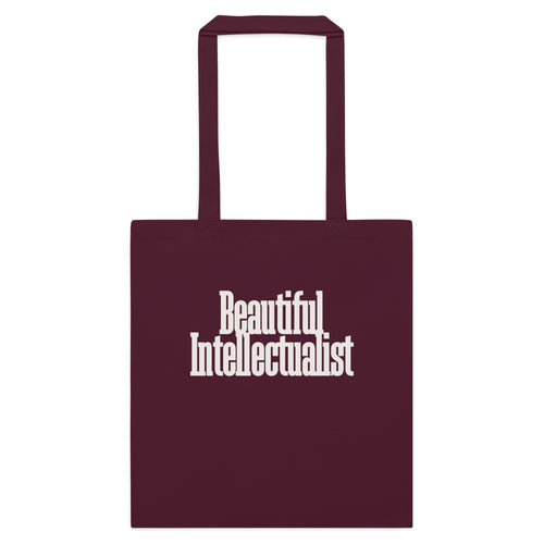 Burgundy cotton tote bag with Beautiful Intellectualist in soft cream condensed serif on the front